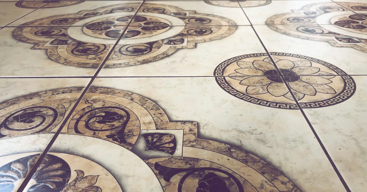Ornate decorative marble tile floor showing premium flooring installation craftsmanship